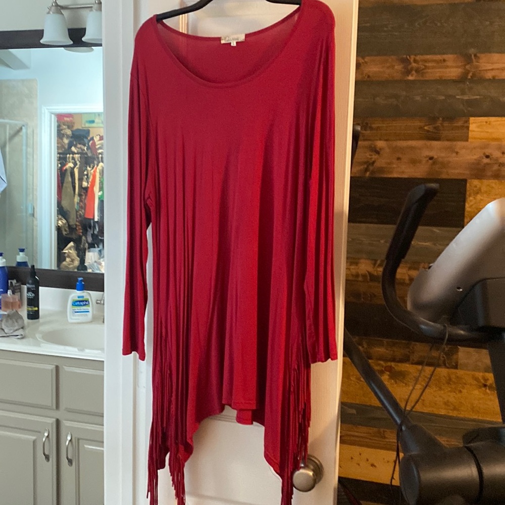 Long sleeve red top with fringe sides